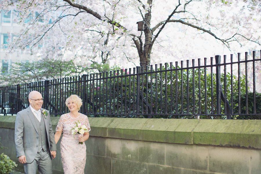 Photography of Sheffield Town Hall wedding registry office on a spring day with cherry blossom in the Peace Gardens