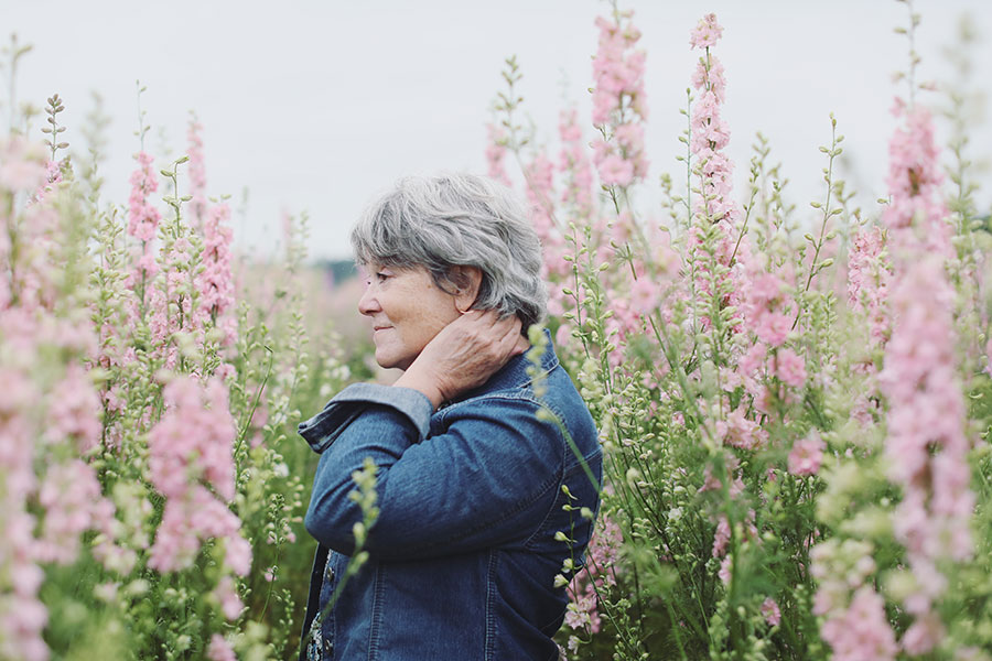 Confetti fields photoshoot Pershore | Portrait photographer Real Flower confetti field photography | Mature lady photoshoot